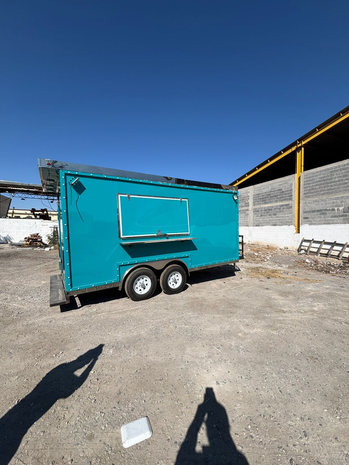 RSV food trailer — black exterior with serving windows